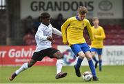 29 April 2017; Stephen O'Driscoll of Carrigaline United AFC in action against Mohammed Ajala of Tramore AFC during the FAI Umbro U17 Challenge cup final match between Carrigaline United AFC and Tramore AFC at Turners Cross in Cork. Photo by Matt Browne/Sportsfile
