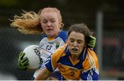 30 April 2017; Ciara Byrne of Wicklow in action against Sinéad Hughes of Longford during the Lidl Ladies Football National League Div 4 Final match between Longford and Wicklow at the Clane Grounds in Kildare.  Photo by Piaras Ó Mídheach/Sportsfile