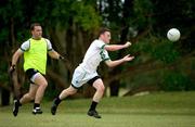 31 October 2011; Leighton Glynn gets in a pass ahead of his Ireland team-mate Neil McGee during a training session in advance of the 2nd International Rules Series 2011 Test, Royal Pines Resort, Gold Coast, Australia. Picture credit: Ray McManus / SPORTSFILE