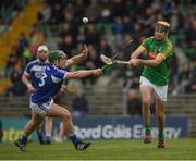 30 April 2017; Shane Whitty of Meath clears under pressure from Willie Dunphy of Laois during the Leinster GAA Hurling Senior Championship Qualifier Group Round 2 match between Meath and Laois at Pairc Tailteann in Meath. Photo by Ray McManus/Sportsfile