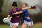 30 April 2017; Catriona Murray of Wexford in action against Elaine Kelly of Tipperary during the Lidl Ladies Football National League Div 3 Final match between Tipperary and Wexford at the Clane Grounds in Kildare.  Photo by Piaras Ó Mídheach/Sportsfile