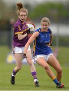 30 April 2017; Niamh Butler of Wexford in action against Jennifer Grant of Tipperary during the Lidl Ladies Football National League Div 3 Final match between Tipperary and Wexford at the Clane Grounds in Kildare.  Photo by Piaras Ó Mídheach/Sportsfile