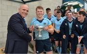30 April 2017; Niall O'Neill of UCD is presented with the McCorry Cup by Niall Rynne, Vice President Leinster Rugby, following the McCorry Cup Final between UCD and Clontarf at St. Mary's RFC in Dublin. Photo by Sam Barnes/Sportsfile
