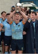 30 April 2017; Niall O'Neill of UCD lifts the McCorry Cup following the McCorry Cup Final between UCD and Clontarf at St. Mary's RFC in Dublin. Photo by Sam Barnes/Sportsfile