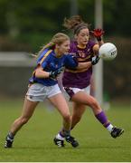 30 April 2017; Ellen O'Brien of Wexford in action against Elaine Kelly of Tipperary during the Lidl Ladies Football National League Div 3 Final match between Tipperary and Wexford at the Clane Grounds in Kildare.  Photo by Piaras Ó Mídheach/Sportsfile