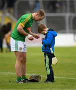 30 April 2017; Robert Johnston, from Kilmessan, Co Meath, tries to activate his pen in his attempt to secure Meath's Joe Keena's autograph after the Leinster GAA Hurling Senior Championship Qualifier Group Round 2 match between Meath and Laois at Pairc Tailteann in Meath. Photo by Ray McManus/Sportsfile