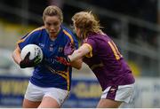 30 April 2017; Aisling McCarthy of Tipperary in action against Catriona Murray of Wexford during the Lidl Ladies Football National League Div 3 Final match between Tipperary and Wexford at the Clane Grounds in Kildare.  Photo by Piaras Ó Mídheach/Sportsfile
