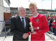 30 April 2017; FAI President Tony Fitzgerald presents Nathan Manson Browne of Leeside AFC with his man of the match award after the FAI Umbro Youth Cup Final match between Aisling Annacotty and Leeside AFC at Jackman Park in Limerick. Photo by Keith Wiseman/Sportsfile