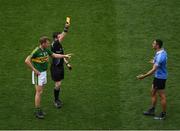 9 April 2017; Referee Paddy Neilan issues a Yellow Card to James McCarthy of Dublin and Donnchadh Walsh of Kerry during the Allianz Football League Division 1 Final match between Dublin and Kerry at Croke Park, in Dublin. Photo by Ray McManus/Sportsfile