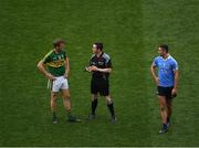 9 April 2017; Referee Paddy Neilan speaks to Donnchadh Walsh of Kerry  and James McCarthy of Dublin before issuing a Yellow Card to both during the Allianz Football League Division 1 Final match between Dublin and Kerry at Croke Park, in Dublin. Photo by Ray McManus/Sportsfile