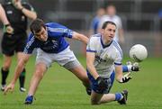 30 October 2011; Enda Muldoon, Ballinderry Shamrocks, in action against Hugh McNulty, Dromore St Dympna’s. AIB Ulster GAA Football Senior Club Championship Quarter-Final, Dromore St Dympna’s v Ballinderry Shamrocks, Healy Park, Omagh, Co. Tyrone. Picture credit: Pat Murphy / SPORTSFILE