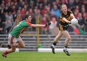 30 October 2011; Colm Cooper, Dr. Crokes, in action against Ger Hartnett, Mid Kerry. Kerry County Senior Football Championship Final, Dr. Crokes v Mid Kerry, Fitzgerald Stadium, Killarney, Co. Kerry. Picture credit: Stephen McCarthy / SPORTSFILE