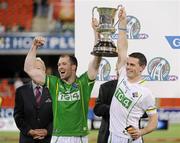 4 November 2011; The Ireland captain Stephen Cluxton and vice-captain Ciaran McKeever lift the Cormac McAnallen Perpetual Trophy after the International Rules 2nd Test, Australia v Ireland, Metricon Stadium, Gold Coast, Australia. Picture credit: Ray McManus / SPORTSFILE