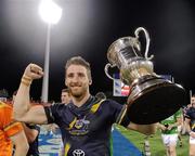 4 November 2011; Zach Touhy, Ireland, celebrates with the Cormac McAnallen Perpetual Trophy after the game. International Rules 2nd Test, Australia v Ireland, Metricon Stadium, Gold Coast, Australia. Picture credit: Ray McManus / SPORTSFILE