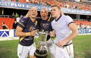4 November 2011; Tadhg Kennelly, Kieran Donaghy and Tommy Walsh, Ireland, celebrate with the Cormac McAnallen Perpetual Trophy after the game. International Rules 2nd Test, Australia v Ireland, Metricon Stadium, Gold Coast, Australia. Picture credit: Ray McManus / SPORTSFILE