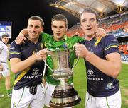 4 November 2011; Paddy Kelly, Eoin Cadogan and Aidan Walsh, Ireland, celebrate with the Cormac McAnallen Perpetual Trophy after the game. International Rules 2nd Test, Australia v Ireland, Metricon Stadium, Gold Coast, Australia. Picture credit: Ray McManus / SPORTSFILE