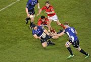 4 November 2011; Man of the match Mike Ross, Leinster, gets his pass away to team-mate Jamie Heaslip, as he is tackled by Lifeimi Mafi, Munster. Celtic League, Leinster v Munster, Aviva Stadium, Lansdowne Road, Dublin. Picture credit: Brendan Moran / SPORTSFILE