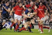 4 November 2011; Cian Healy, Leinster, is tackled by Niall Ronan and Conor Murray, right, Munster. Celtic League, Leinster v Munster, Aviva Stadium, Lansdowne Road, Dublin. Picture credit: Stephen McCarthy / SPORTSFILE
