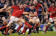 4 November 2011; Cian Healy, Leinster, is tackled by Niall Ronan, Munster. Celtic League, Leinster v Munster, Aviva Stadium, Lansdowne Road, Dublin. Picture credit: Stephen McCarthy / SPORTSFILE