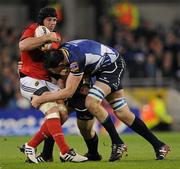 4 November 2011; Denis Leamy, Munster, is tackled by Devin Toner, right, and Cian Healy, Leinster. Celtic League, Leinster v Munster, Aviva Stadium, Lansdowne Road, Dublin. Picture credit: Stephen McCarthy / SPORTSFILE