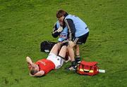 4 November 2011; Keith Earls, Munster, receives medical attention before leaving the pitch with an injury. Celtic League, Leinster v Munster, Aviva Stadium, Lansdowne Road, Dublin. Picture credit: Brendan Moran / SPORTSFILE