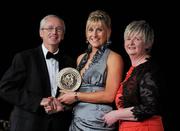 5 November 2011; Waterford's Aisling O'Brien is presented with her 2011 Camogie Soaring Star award by John Treacy, CEO of the Irish Sports Council, Joan O' Flynn, President of the Camogie Association, at the 2011 Camogie All-Stars in association with O’Neills. Citywest Hotel, Saggart, Co. Dublin. Picture credit: Stephen McCarthy / SPORTSFILE