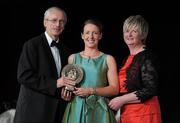 5 November 2011; Waterford's Emma Hannon is presented with her 2011 Camogie Soaring Star award by John Treacy, CEO of the Irish Sports Council and Joan O' Flynn, President of the Camogie Association, at the 2011 Camogie All-Stars in association with O’Neills. Citywest Hotel, Saggart, Co. Dublin. Picture credit: Stephen McCarthy / SPORTSFILE