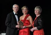 5 November 2011; Down's Orla Maginn is presented with her 2011 Camogie Soaring Star award by John Treacy, CEO of the Irish Sports Council and Joan O' Flynn, President of the Camogie Association, at the 2011 Camogie All-Stars in association with O’Neills. Citywest Hotel, Saggart, Co. Dublin. Picture credit: Stephen McCarthy / SPORTSFILE