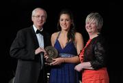 5 November 2011; Meath's Áine Keogh is presented with her 2011 Camogie Soaring Star award by John Treacy, CEO of the Irish Sports Council and Joan O' Flynn, President of the Camogie Association, at the 2011 Camogie All-Stars in association with O’Neills. Citywest Hotel, Saggart, Co. Dublin. Picture credit: Stephen McCarthy / SPORTSFILE