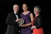 5 November 2011; Down's Fionnuala Carr is presented with her 2011 Camogie Soaring Star award by John Treacy, CEO of the Irish Sports Council and Joan O' Flynn, President of the Camogie Association, at the 2011 Camogie All-Stars in association with O’Neills. Citywest Hotel, Saggart, Co. Dublin. Picture credit: Stephen McCarthy / SPORTSFILE