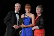 5 November 2011; Waterford's Gráinne Kenneally is presented with her 2011 Camogie Soaring Star award by John Treacy, CEO of the Irish Sports Council and Joan O' Flynn, President of the Camogie Association, at the 2011 Camogie All-Stars in association with O’Neills. Citywest Hotel, Saggart, Co. Dublin. Picture credit: Stephen McCarthy / SPORTSFILE
