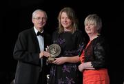 5 November 2011; Waterford's Patricia Jackman is presented with her 2011 Camogie Soaring Star award by John Treacy, CEO of the Irish Sports Council and Joan O' Flynn, President of the Camogie Association, at the 2011 Camogie All-Stars in association with O’Neills. Citywest Hotel, Saggart, Co. Dublin. Picture credit: Stephen McCarthy / SPORTSFILE