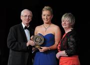 5 November 2011; Down's Catherine McGourty is presented with her 2011 Camogie Soaring Star award by John Treacy, CEO of the Irish Sports Council and Joan O' Flynn, President of the Camogie Association, at the 2011 Camogie All-Stars in association with O’Neills. Citywest Hotel, Saggart, Co. Dublin. Picture credit: Stephen McCarthy / SPORTSFILE