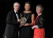 5 November 2011; Armagh's Collette McSorley is presented with her 2011 Camogie Soaring Star award by John Treacy, CEO of the Irish Sports Council and Joan O' Flynn, President of the Camogie Association, at the 2011 Camogie All-Stars in association with O’Neills. Citywest Hotel, Saggart, Co. Dublin. Picture credit: Stephen McCarthy / SPORTSFILE