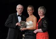 5 November 2011; Waterford's Karen Kelly is presented with her 2011 Camogie Soaring Star award by John Treacy, CEO of the Irish Sports Council and Joan O' Flynn, President of the Camogie Association, at the 2011 Camogie All-Stars in association with O’Neills. Citywest Hotel, Saggart, Co. Dublin. Picture credit: Stephen McCarthy / SPORTSFILE