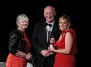 5 November 2011; Galway's Susan Earner is presented with her 2011 Camogie All-Star award by Joan O' Flynn, President of the Camogie Association, and Brian Cody, Kilkenny hurling manager, at the 2011 Camogie All-Stars in association with O’Neills. Citywest Hotel, Saggart, Co. Dublin. Picture credit: Stephen McCarthy / SPORTSFILE