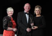 5 November 2011; Galway's Lorraine Ryan is presented with her 2011 Camogie All-Star award by Joan O' Flynn, President of the Camogie Association, and Brian Cody, Kilkenny hurling manager, at the 2011 Camogie All-Stars in association with O’Neills. Citywest Hotel, Saggart, Co. Dublin. Picture credit: Stephen McCarthy / SPORTSFILE
