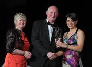 5 November 2011; Galway's Ann-Marie Hayes is presented with her 2011 Camogie All-Star award by Joan O' Flynn, President of the Camogie Association, and Brian Cody, Kilkenny hurling manager, at the 2011 Camogie All-Stars in association with O’Neills. Citywest Hotel, Saggart, Co. Dublin. Picture credit: Stephen McCarthy / SPORTSFILE