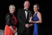 5 November 2011; Galway's Therese Maher is presented with her 2011 Camogie All-Star award by Joan O' Flynn, President of the Camogie Association, and Brian Cody, Kilkenny hurling manager, at the 2011 Camogie All-Stars in association with O’Neills. Citywest Hotel, Saggart, Co. Dublin. Picture credit: Stephen McCarthy / SPORTSFILE