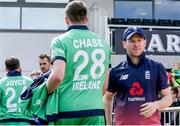 5 May 2017; England captain Eóin Morgan commiserates with Peter Chase of Ireland after the One Day International between England and Ireland at The Brightside Ground in Bristol, England. Photo by Matt Impey/Sportsfile