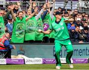 5 May 2017; Fans dressed a beer bottles celebrate as Kevin O’Brien of Ireland fields the ball during the One Day International between England and Ireland at The Brightside Ground in Bristol, England. Photo by Matt Impey/Sportsfile
