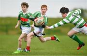 6 May 2017; Callum Murphy of St Brigids Newbridge, Co Kildare, is tagged by Cathal Shovelin of St Mary's, Co Sligo whilst competing in U14 and O11 Mixed Tag Rugby during the Aldi Community Games May Festival 2017 at National Sports Campus, in Abbotstown, Dublin.  Photo by Sam Barnes/Sportsfile