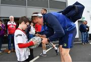 6 May 2017; Leinster's Garry Ringrose signs an autograph for 8 year old Ulster supporter Mark Buchanan ahead of the Guinness PRO12 Round 22 match between Ulster and Leinster at the Kingspan Stadium in Belfast. Photo by Ramsey Cardy/Sportsfile