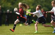 6 May 2017; Lesley Ann Sweeney, from Ballymote, Co. Sligo, on her way to scoring a try against Monaghanstown, Co. Monaghan, in the U11 tag rugby event at the Aldi Community Games May Festival 2017 at National Sports Campus, in Abbotstown, Dublin. Photo by Cody Glenn/Sportsfile