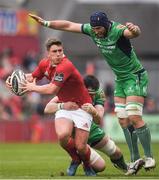 6 May 2017; Ian Keatley of Munster is tackled by Andrew Browne and John Muldoon, right, of Connacht during the Guinness PRO12 Round 22 match between Munster and Connacht at Thomond Park, in Limerick. Photo by Brendan Moran/Sportsfile