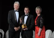 5 November 2011; Wexford manager JJ Doyle is presented with his 2011 Camogie All-Star Manager of the Year award by Tony Towell, Managing Director of O'Neills, and Joan O' Flynn, President of the Camogie Association, at the 2011 Camogie All-Stars in association with O’Neills. Citywest Hotel, Saggart, Co. Dublin. Picture credit: Stephen McCarthy / SPORTSFILE