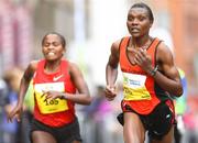 31 October 2011; Radiya Adilo, Ethiopia, left, and Emily Rotich, Kenya, in action during the 2011 National Lottery Dublin Marathon. Dublin. Picture credit: Tomas Greally / SPORTSFILE