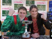 6 November 2011; Jockey Johnny Murtagh is presented with his 2011 Champion Flat Jockey Trophy by Guest of Honour Katie Taylor, World and European Boxing Champion. Leopardstown - 2011 Flat Season Finale Day, Leopardstown Racecourse, Dublin. Picture credit: Stephen McCarthy / SPORTSFILE