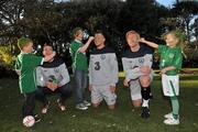 7 November 2011; Three, Sean St. Ledger, Simon Cox and Paul McShane, with children, left to right, Bobby Pakenham, age 6, Jade Pakenham, age 11, and Emma Hayes, age 5, all from Dublin, are asking Irish fans to  'Go Green With Pride' to show their support for the crucial EURO playoffs against Estonia on November 11th and 15th. Three will be providing face painters at the home leg to paint fans' faces green and placing 50K green cards for fans to hold up at the match on every chair in the Aviva Stadium on the 15th. Supporters can also still trade in their old Republic of Ireland football jerseys in any Champion Sports store nationwide and get €20 off the new home jersey. The traded in jerseys will be donated to Friends In Ireland, a charity founded by Marian Finucane that Sean St. Ledger is an ambassador with. The scheme has been extended to run until November 20th. Portmarnock Hotel and Golf Links, Portmarnock, Co. Dublin. Picture credit: David Maher / SPORTSFILE