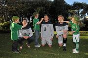 7 November 2011; Three, Sean St. Ledger, Simon Cox and Paul McShane, with children, left to right, Bobby Pakenham, age 6, Jade Pakenham, age 11, and Emma Hayes, age 5, all from Dublin, are asking Irish fans to  'Go Green With Pride' to show their support for the crucial EURO playoffs against Estonia on November 11th and 15th. Three will be providing face painters at the home leg to paint fans' faces green and placing 50K green cards for fans to hold up at the match on every chair in the Aviva Stadium on the 15th. Supporters can also still trade in their old Republic of Ireland football jerseys in any Champion Sports store nationwide and get €20 off the new home jersey. The traded in jerseys will be donated to Friends In Ireland, a charity founded by Marian Finucane that Sean St. Ledger is an ambassador with. The scheme has been extended to run until November 20th. Portmarnock Hotel and Golf Links, Portmarnock, Co. Dublin. Picture credit: David Maher / SPORTSFILE